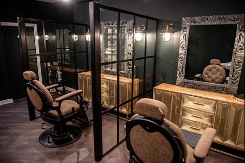 Barber in the new War Paint For Men store on London's Carnaby Street